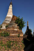 Inle Lake Myanmar. Indein, a cluster of ancient stupas  ruined and overgrown with bushes, just behind the village.